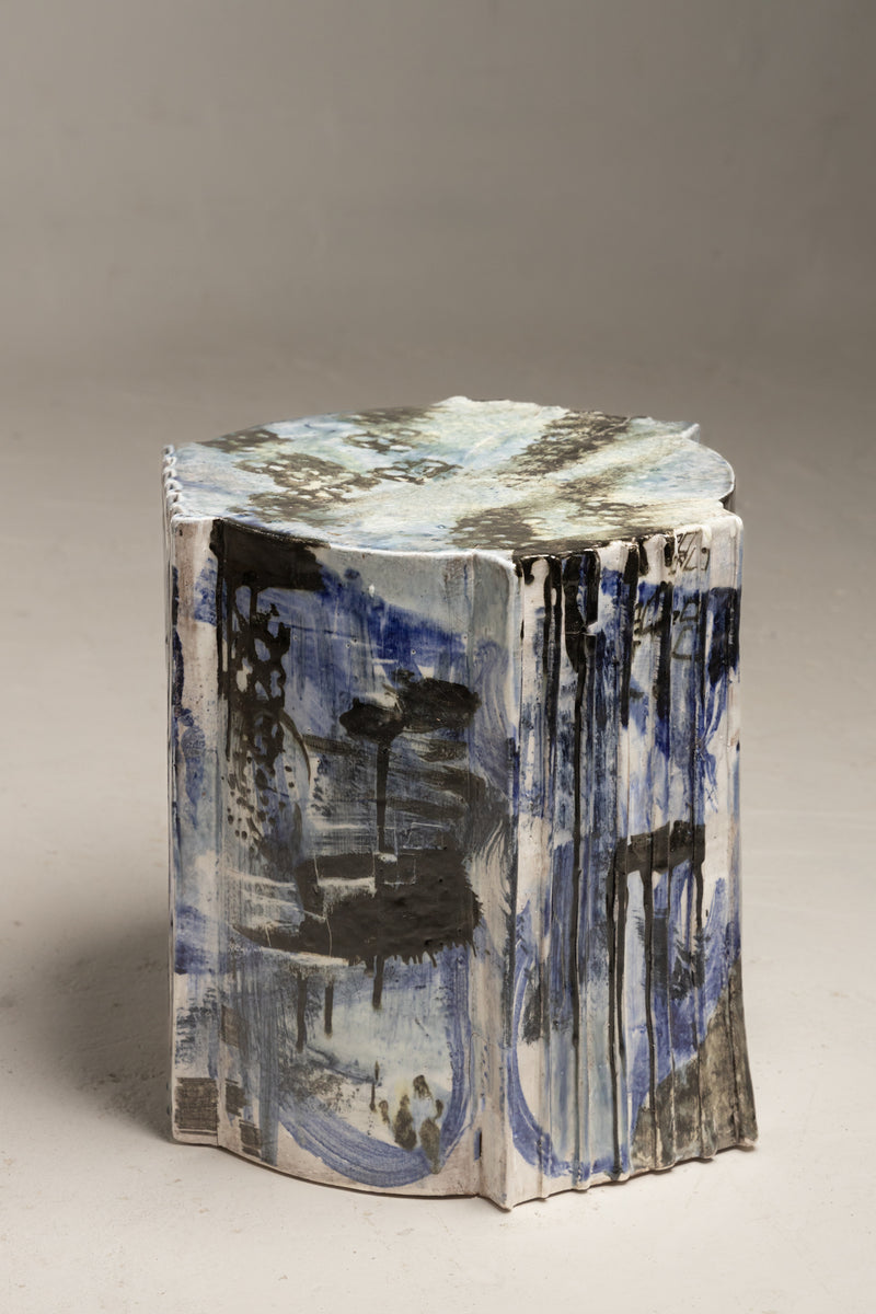 Immerse your space in the stormy expression of art with this ceramic piece, where the brush swings loaded with blues and dark sepia hues. Interactive erasing swipes add an intriguing touch - DJKCDD