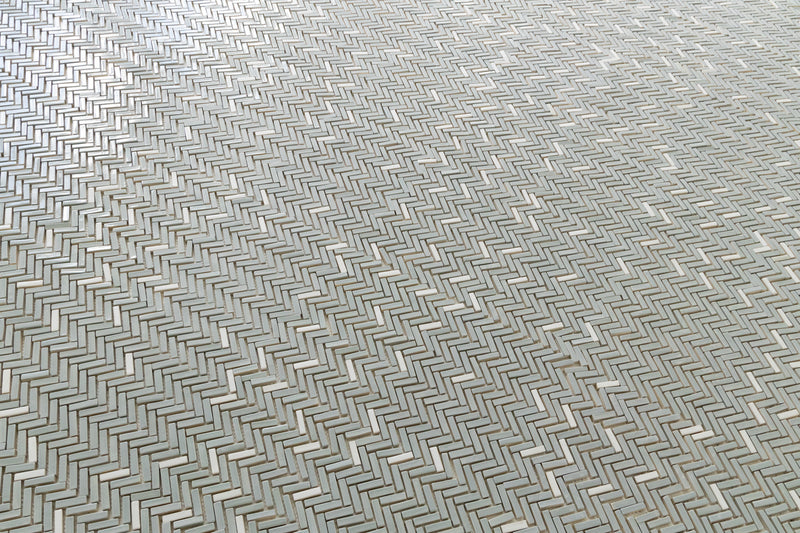 Grey Herringbone Mosaic Tiles with Splashes of White on Mesh - GMFEYZ