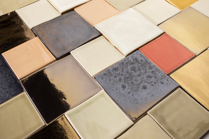 Colourful blend of warm colours and bronze square tiles NTEWUK