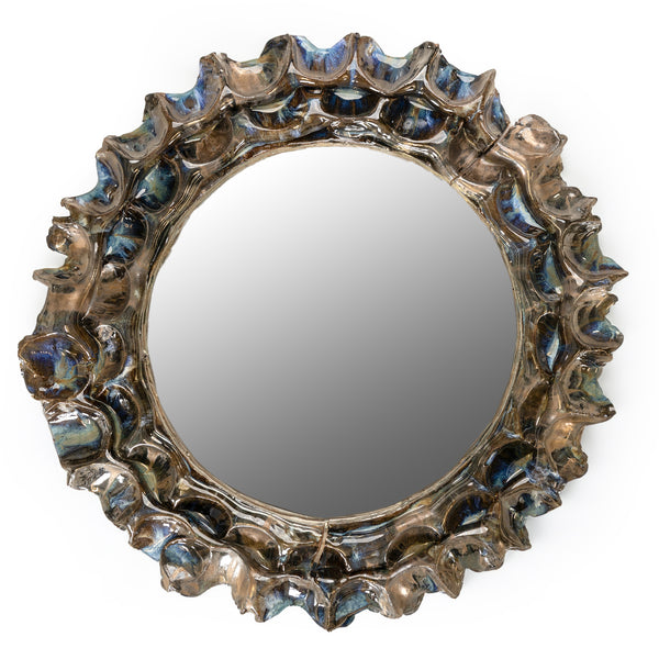 Confident cutouts by skilled artists, creating a robust textural frame. Blue and bronze flashes accentuate the mirror’s surface, adding a dynamic and artistic flair that commands attention - RGRSFG