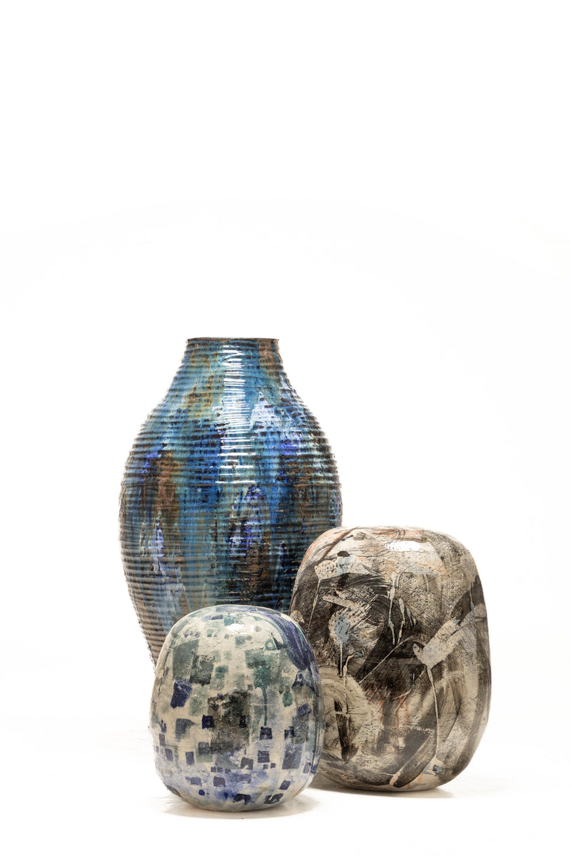 Vessel adorned with enchanting glazes in shades of blue, bronze, and earthy green - XWKDGB
